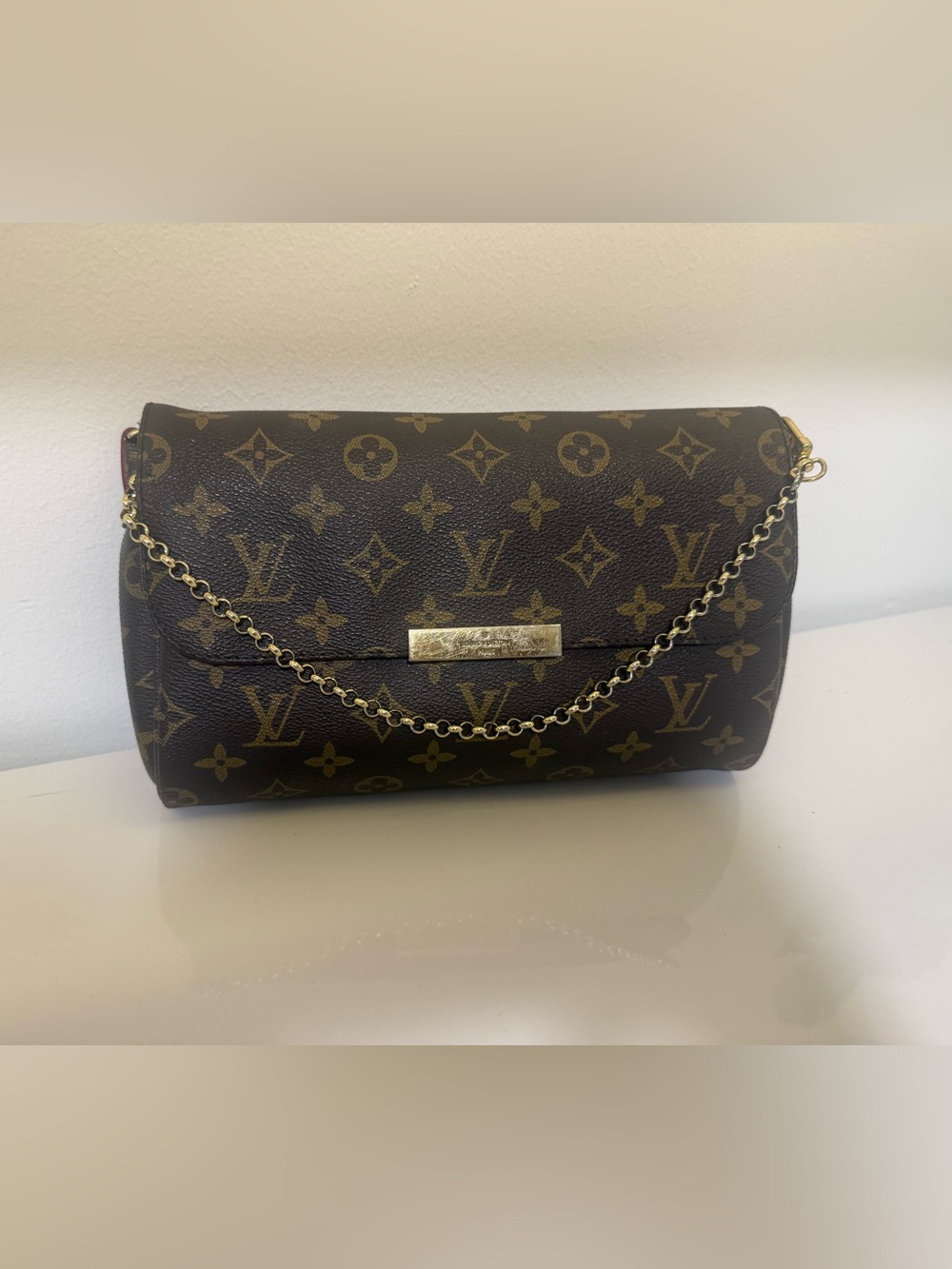Louis Vuitton Monogram Canvas Chain Wristlet in Brown with Gold Hardware